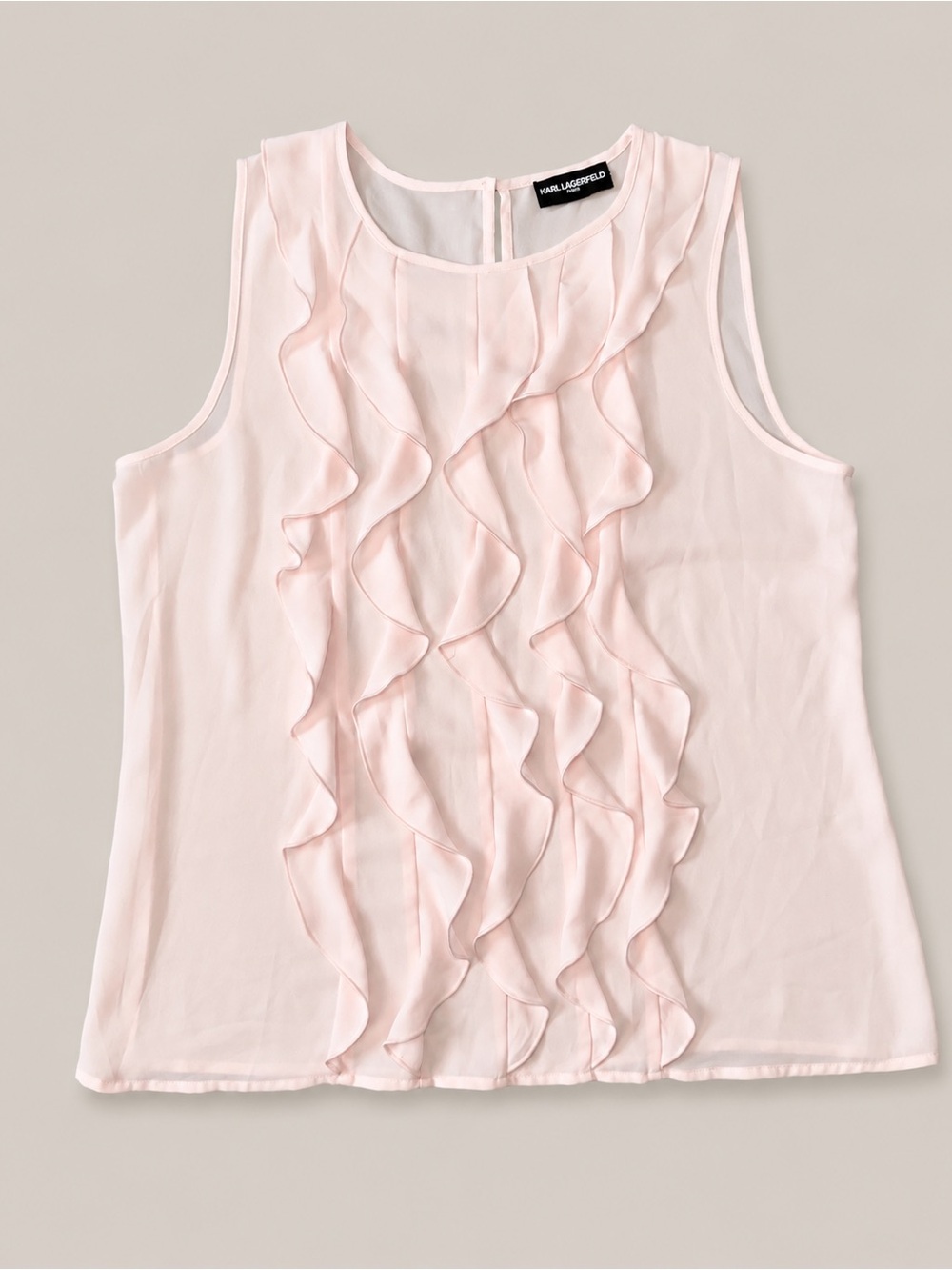Elegant Karl Lagerfeld Paris sleeveless blouse in a soft pale pink/blush shade.